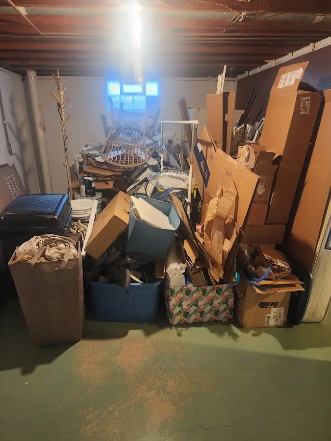 Roll-off dumpster container at job site for Construction Dumpster Rental in Prospect Park